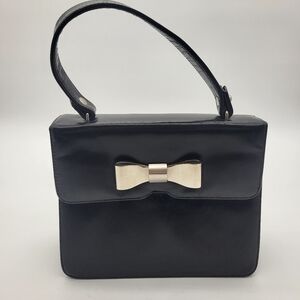 Structured Top Handle Black Bow Accent Handbag